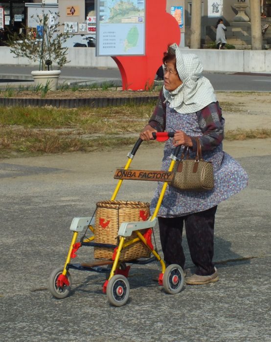 An old lady and her Onba on Ogijima.